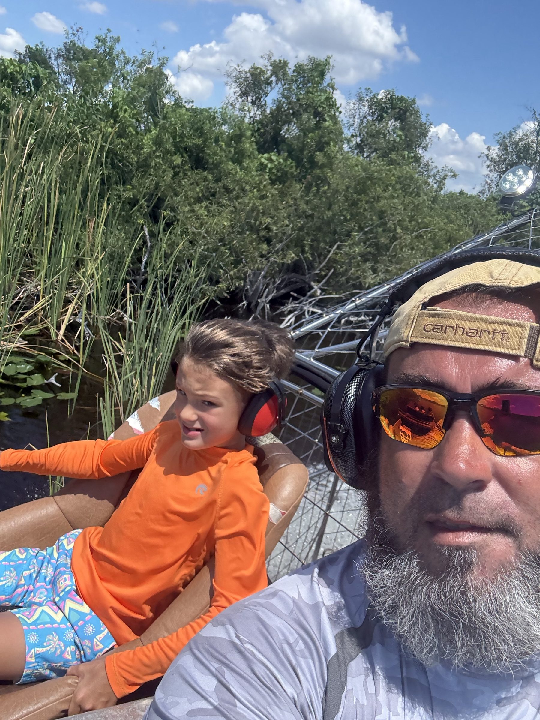 Captain and young guest on one of our airboat tours Davie families book in the northern Everglades