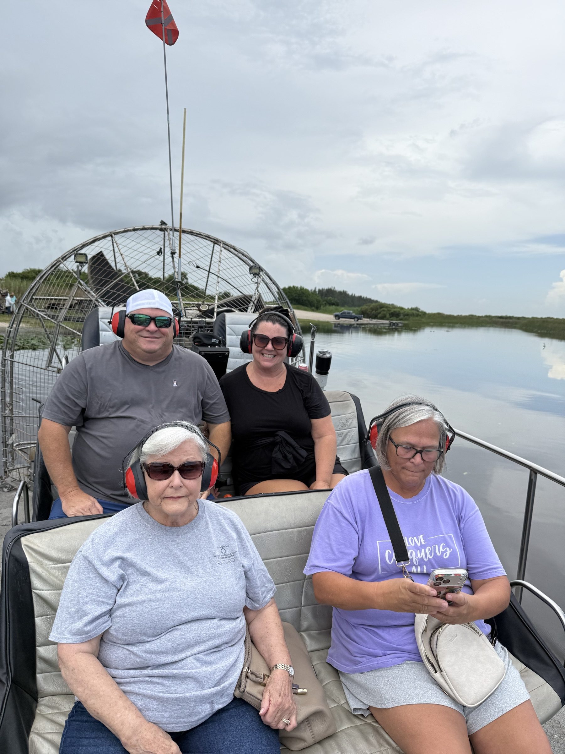 Older couple smiling on one of our airboat tours Plantation residents book in the northern Everglades