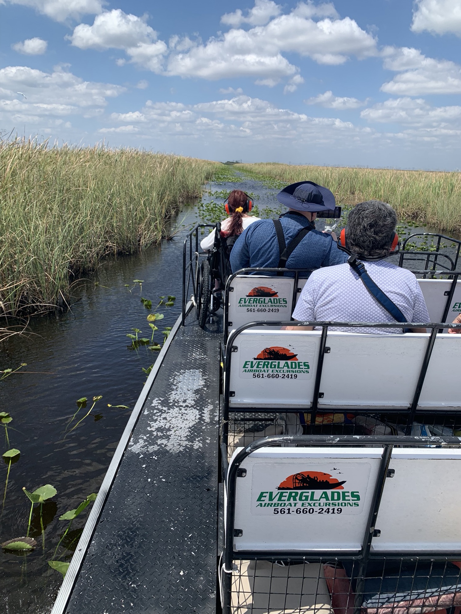 Guests riding a private Aces airboat deep into the Everglades on a tour from Fort Lauderdale